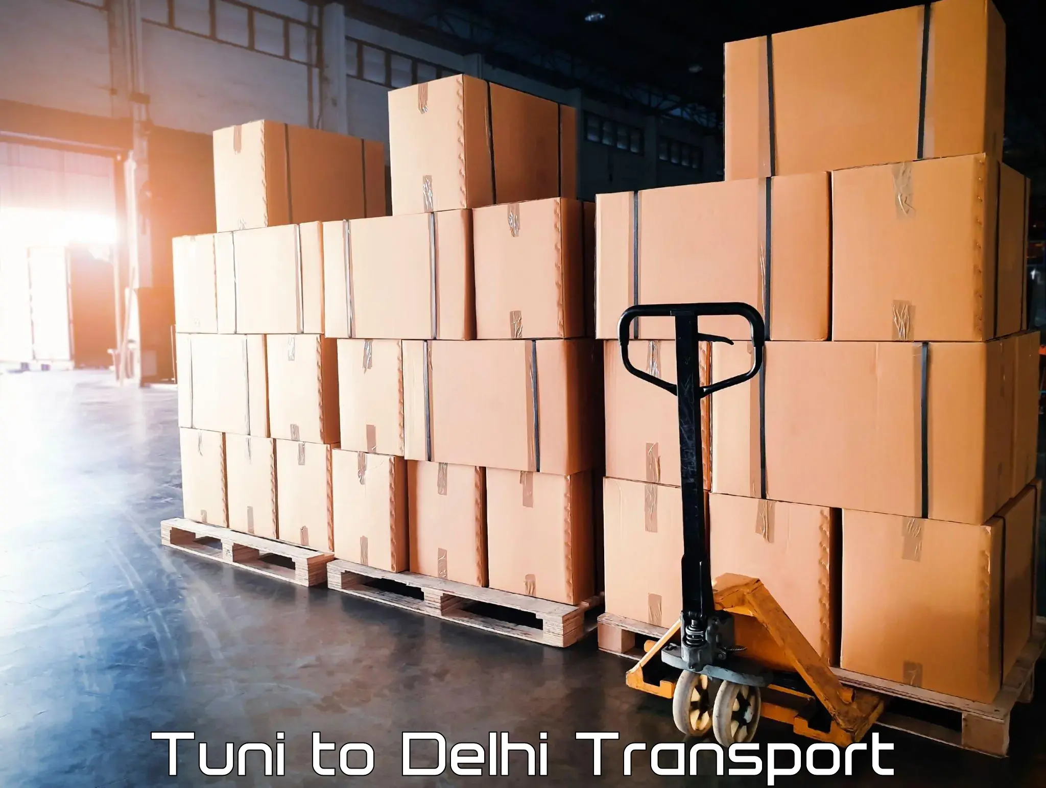 Two wheeler transport services Tuni to Jamia Millia Islamia New Delhi
